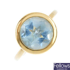 An 18ct gold topaz single-stone ring.