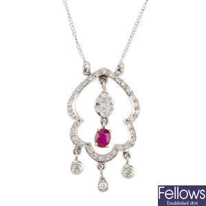 A diamond and ruby pendant, on chain.