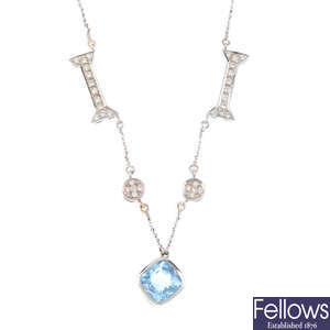A topaz and diamond necklace.