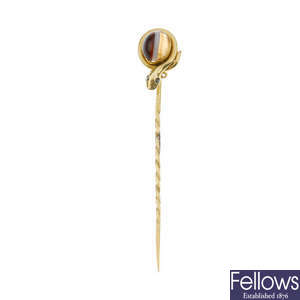 A banded agate and diamond coiled snake stickpin.