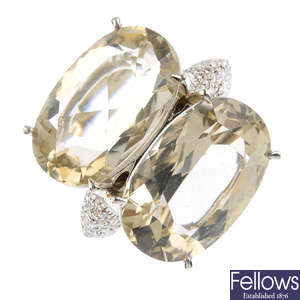 A diamond and prasiolite diamond dress ring.