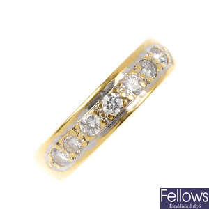 An 18ct gold diamond half-circle eternity ring.