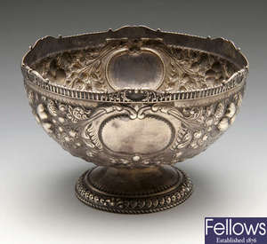 A late Victorian large silver embossed footed bowl.