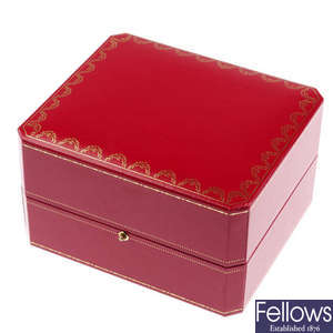 CARTIER - a pair of complete watch boxes.