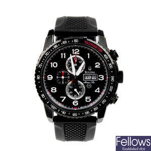 BULOVA - a gentleman's PVD-treated stainless steel Marine Star chronograph wrist watch with two Bulova watches.
