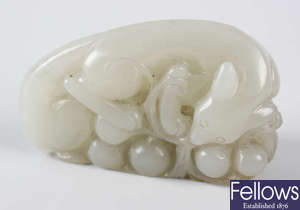 A Chinese carved white jade study.