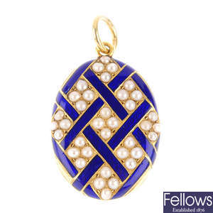 A late Victorian gold, enamel and split pearl memorial pendant. 