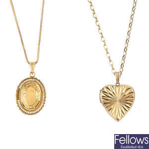 A 14ct gold locket and a front and back locket and two 9ct gold chains.