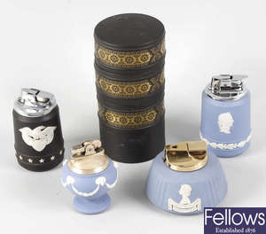 A collection of sixteen Wedgwood jasperware cigarette lighters.