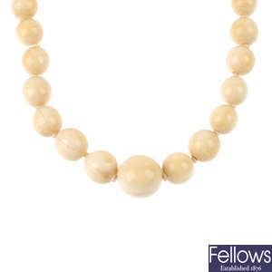 An early 20th century ivory bead necklace.