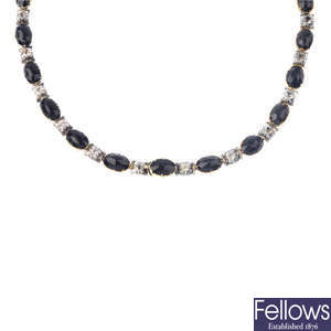 Two sapphire and black paste necklace.