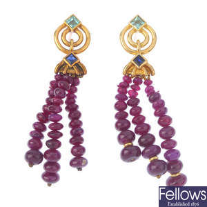 A pair of 18ct gold gem-set earrings.
