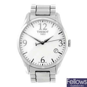 TISSOT - a gentleman's stainless steel bracelet watch together with another watch.
